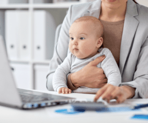 Businesswoman with Baby Working at Office