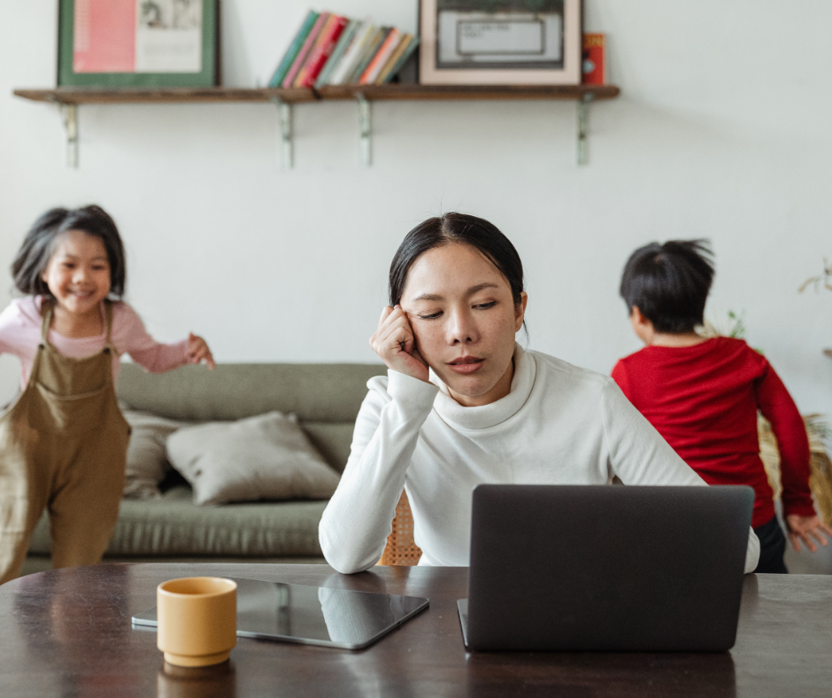 Kids making noise and disturbing mom working at home