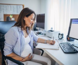 a pregnant woman working