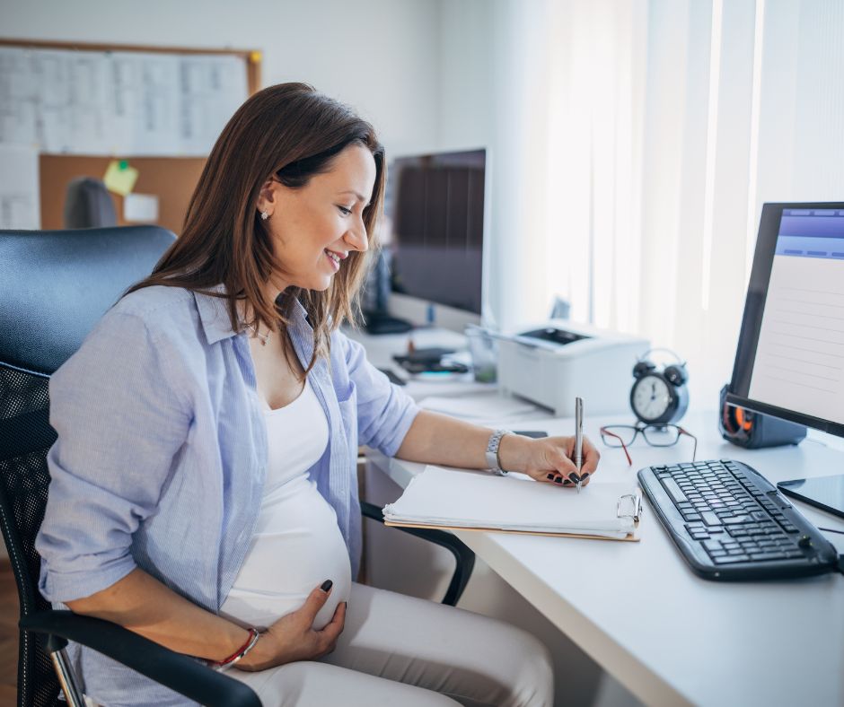 a pregnant woman working