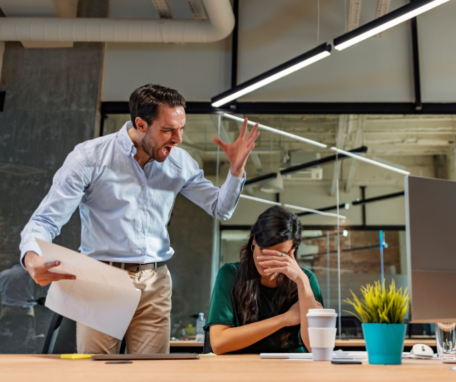 An employer is yelling at an employee showing signs of hostile work environment