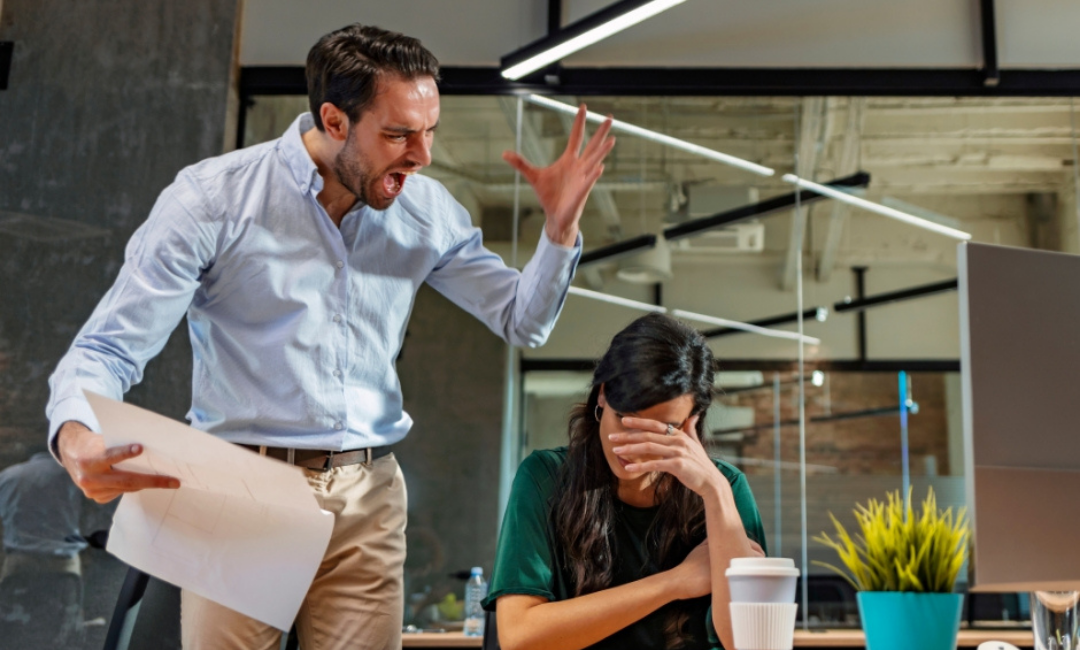 An employer is yelling at an employee showing signs of hostile work environment