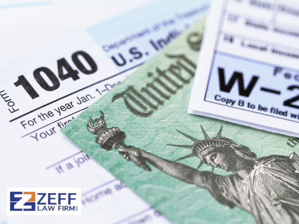 Close-up of federal and state tax documents for severance package taxation